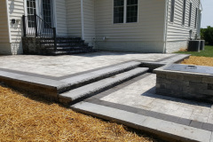 Paver Patio with Stone Wall & Firepit