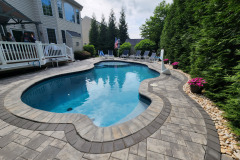 Paver Patio Landscaping Around Swimming Pool